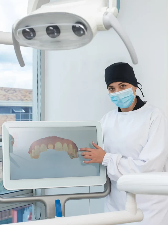 dentist-woman-screen-showing-3d-dental-model-dental-clinic-concept